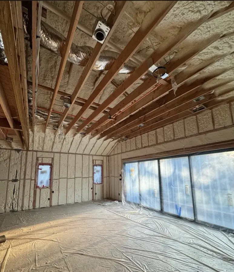 Interior walls and ceiling insulated with spray foam during new construction in Camp Hill